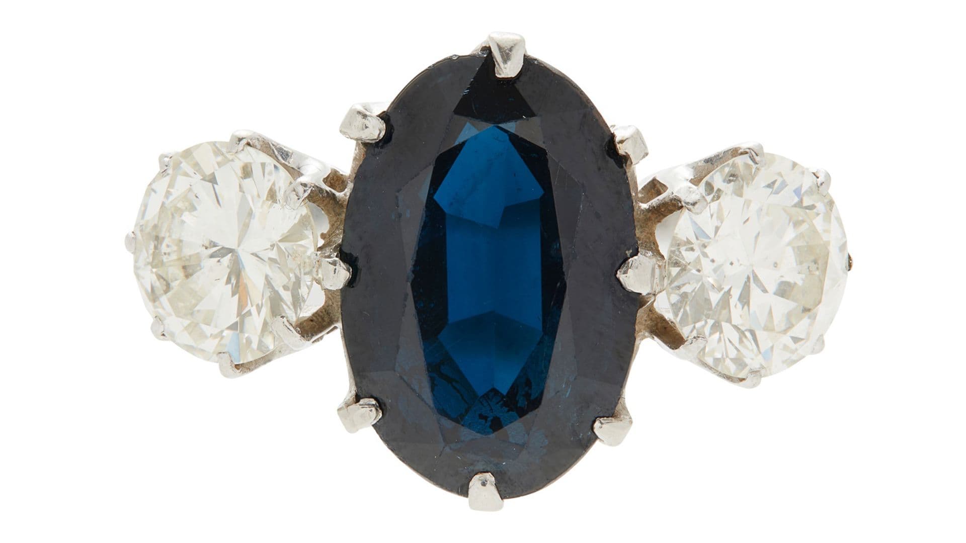 A SAPPHIRE AND DIAMOND SET THREE STONE RING Sold for £4,250